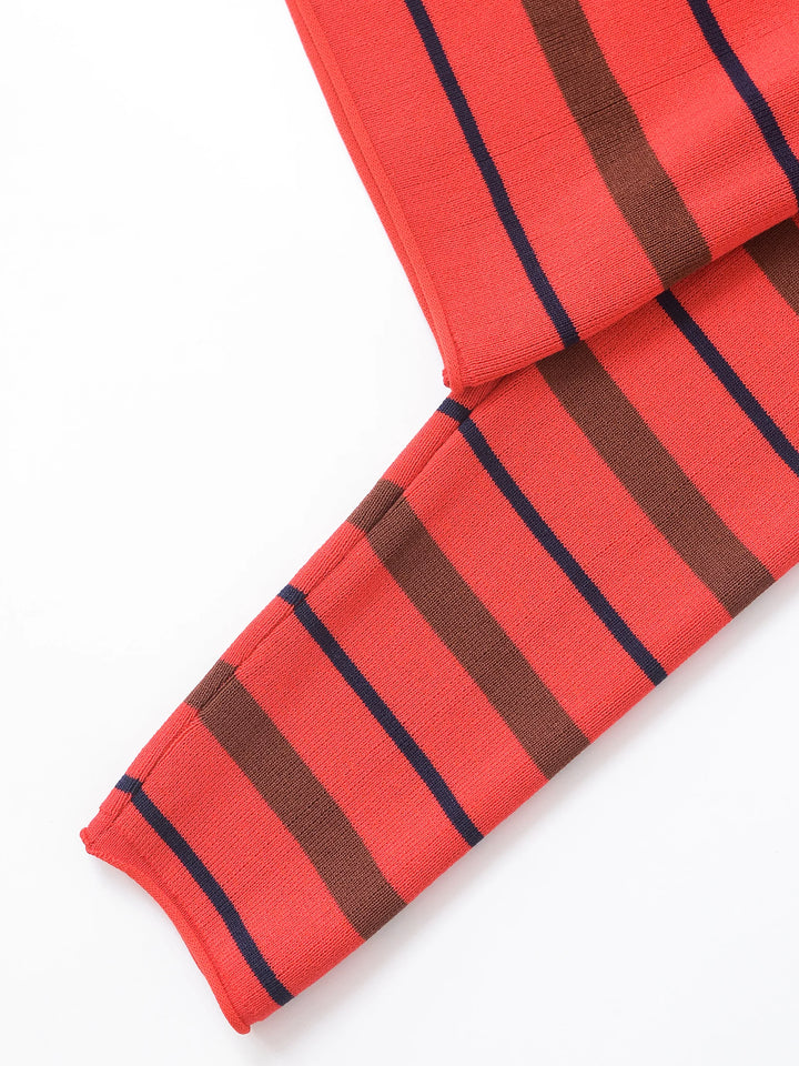 Orange-red striped polo sweater sleeve cuff with navy and brown horizontal stripes