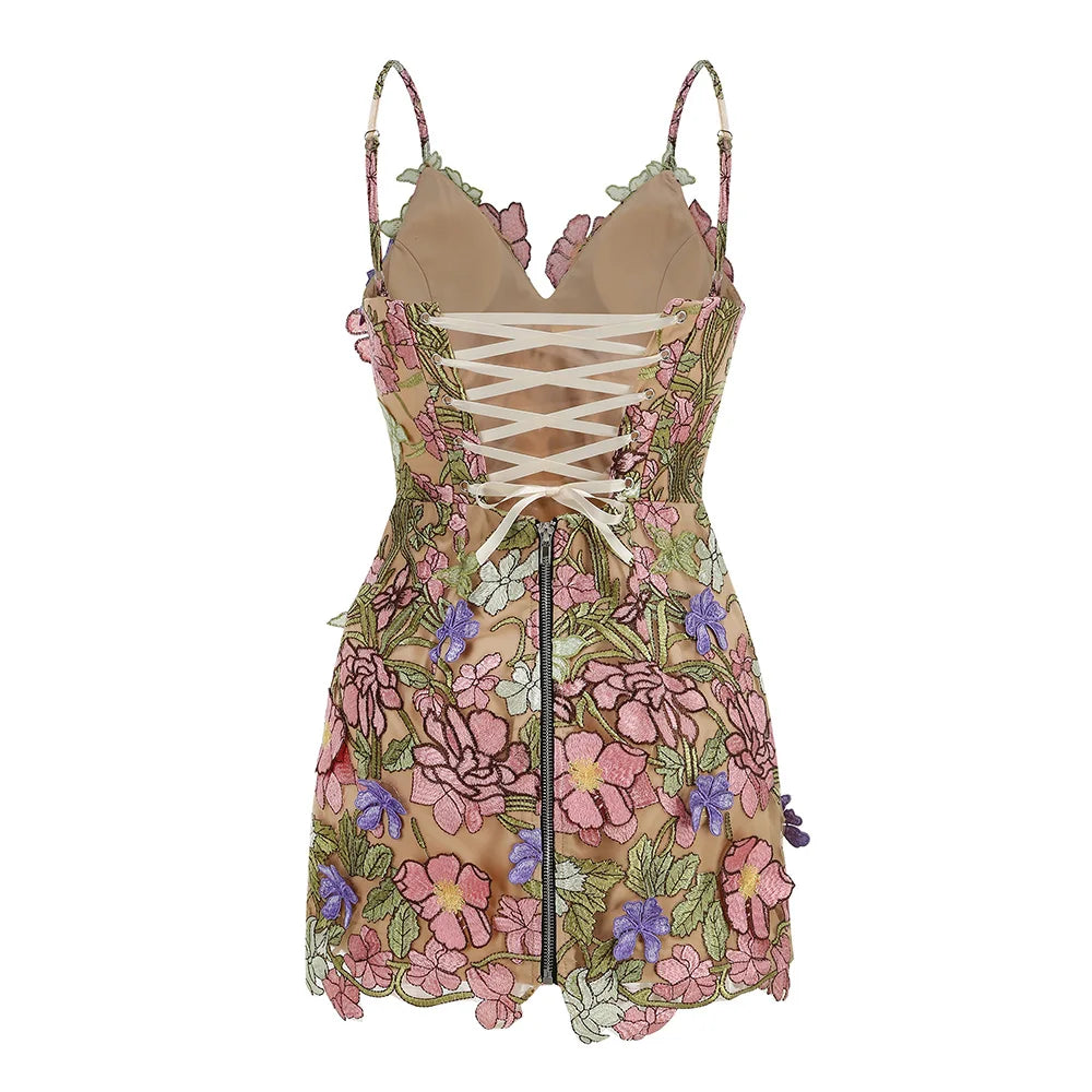 Pink floral mini gown with lace-up back detail and multicolor flower embroidery
