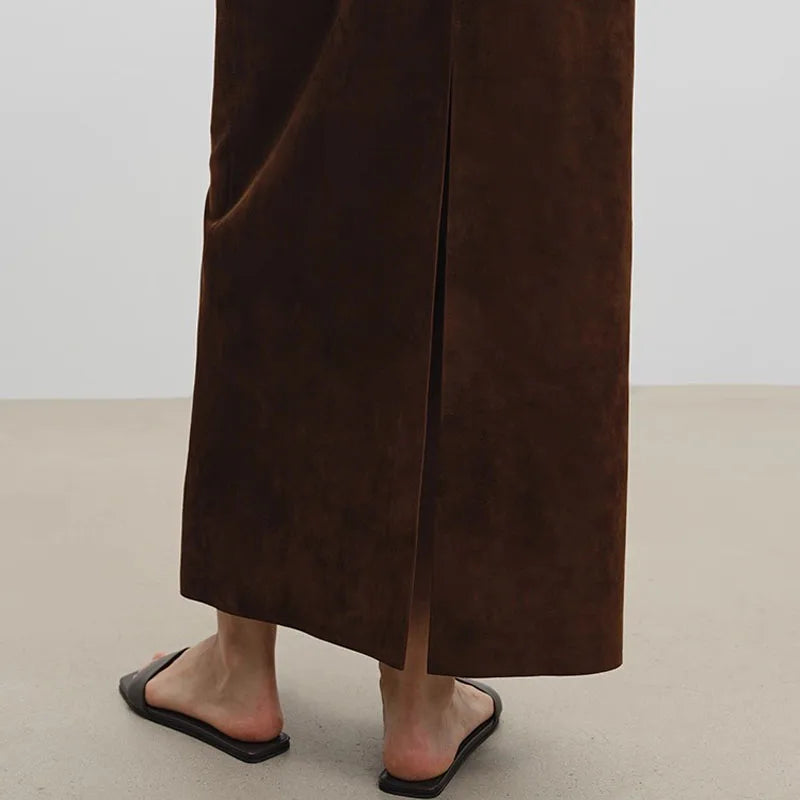 Women’s suede maxi skirt in brown with vertical front seam and long center slit
