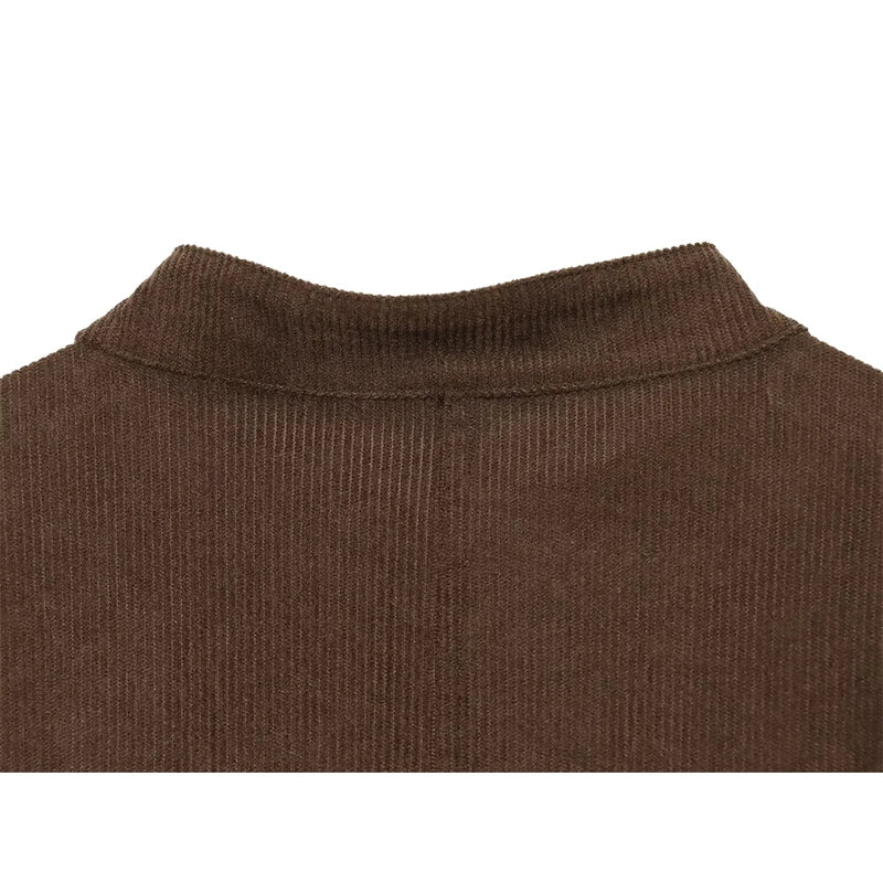 Brown cropped jacket with ribbed stand collar and button placket seam detail