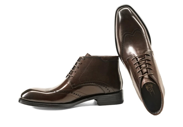 Brown lace-up brogue ankle boots with wingtip design and low stacked heel