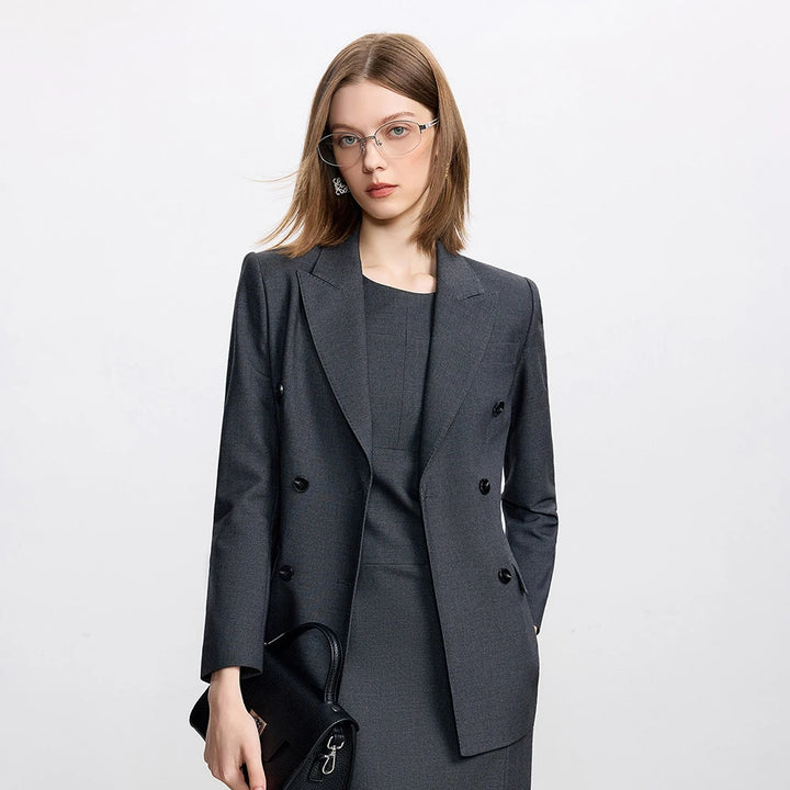 Dark gray blazer with notched lapels and matching knee-length pencil skirt set