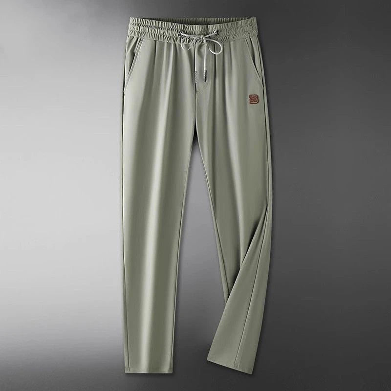 Sage green men's jogger pants, elastic waist with drawstring, straight tapered legs