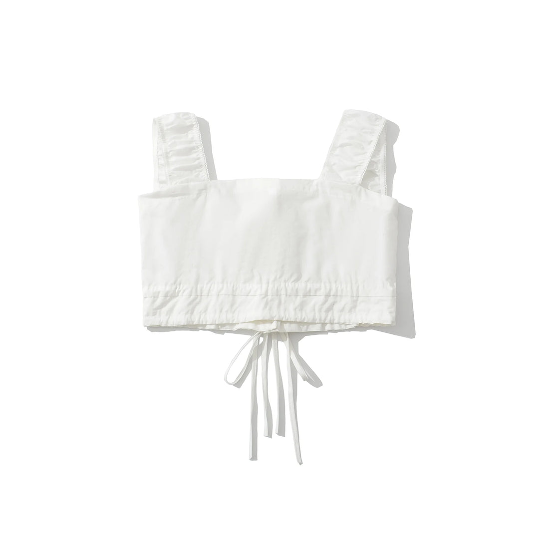 White ruffle mini skirt with elastic waist and front tie strings