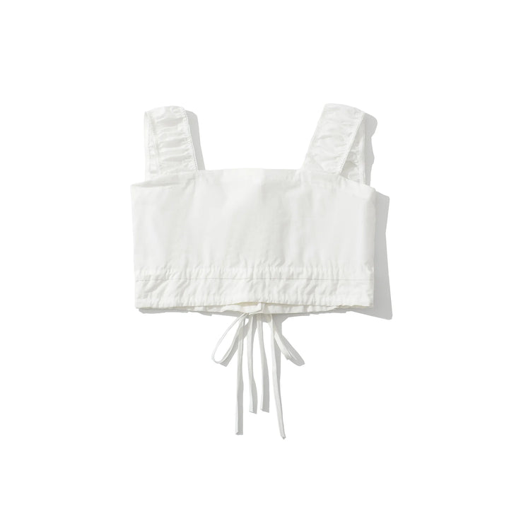 White ruffle mini skirt with elastic waist and front tie strings