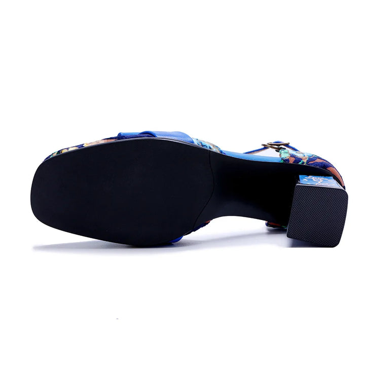 Dark blue high-heel sandal outsole with blue ankle strap and floral upper