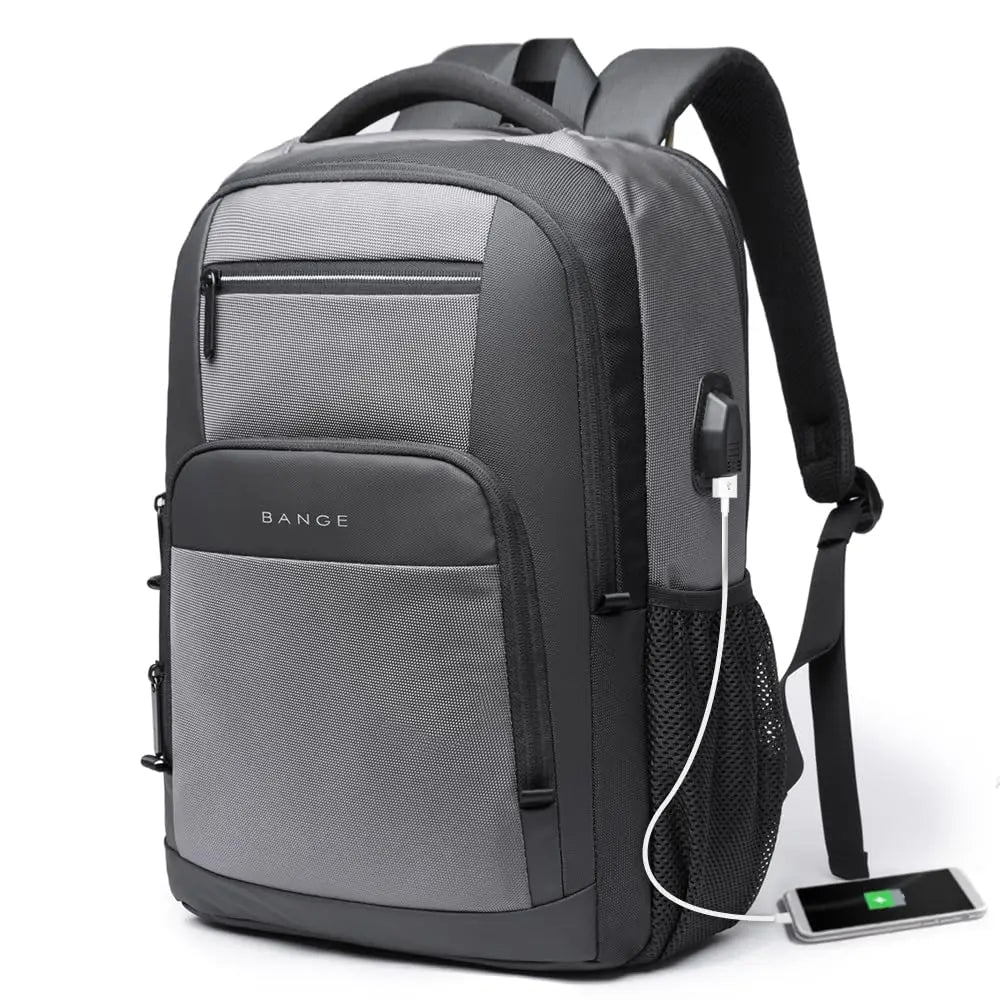Grey waterproof backpack with front zip pocket, mesh side panel, and USB charging