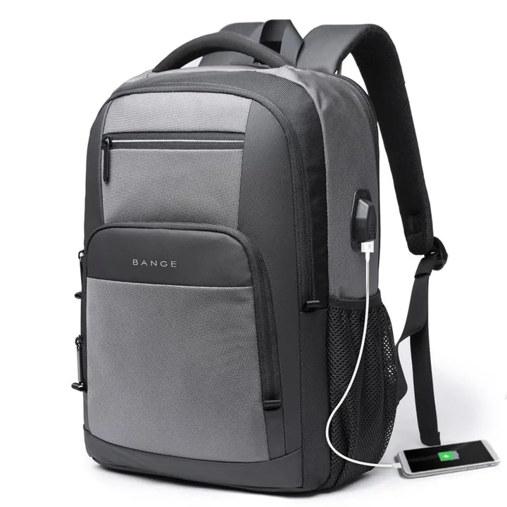 Grey waterproof backpack with front zip pocket, mesh side panel, and USB charging