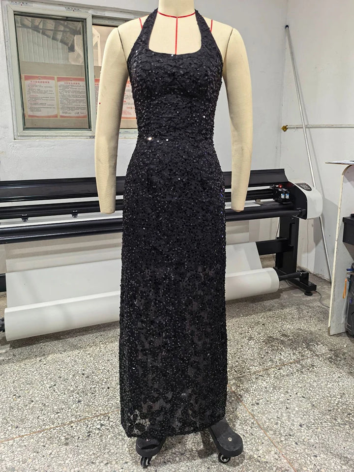 Black sequin halter bodycon gown on mannequin, 3D floral sparkle, floor length
