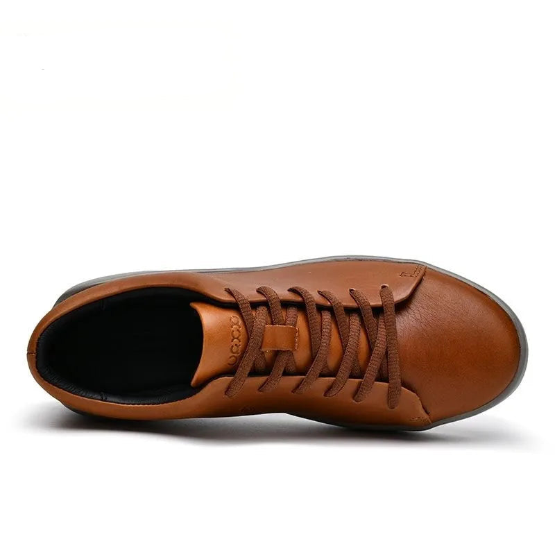 A single brown leather low-top sneaker shown from a side profile view on a white background, with the URXX LEISUREBRAND logo printed in the top left corner.