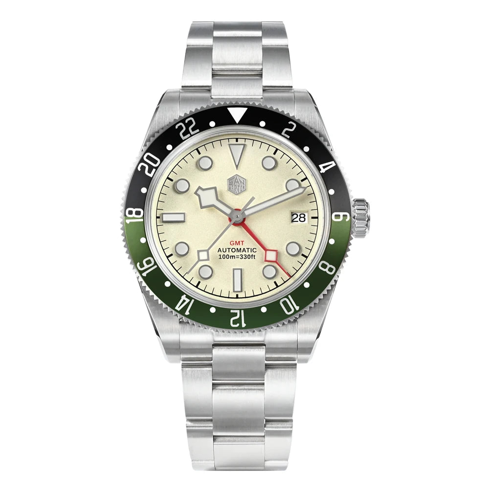 Classic bidirectional bezel watch with cream dial, green bezel, and stainless steel bracelet