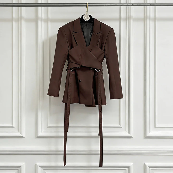 Women’s brown stand-collar blazer on hanger with pleated wrap front and long waist ties