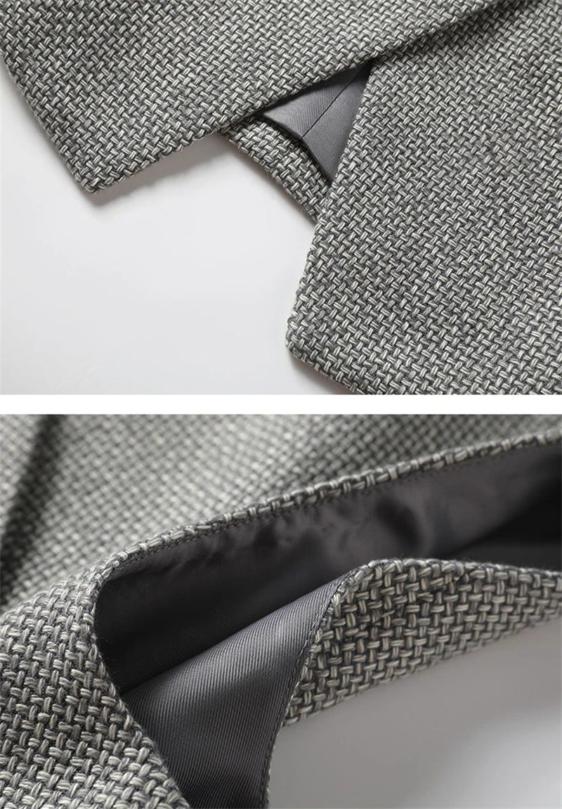 Grey tweed sleeveless waistcoat with V-neck opening and interior facing