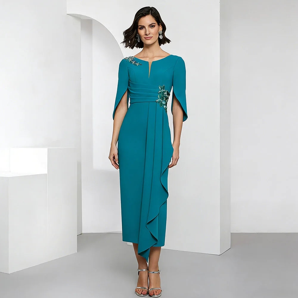 Teal satin tea-length wedding dress with draped skirt, floral appliques, 3/4 sleeves