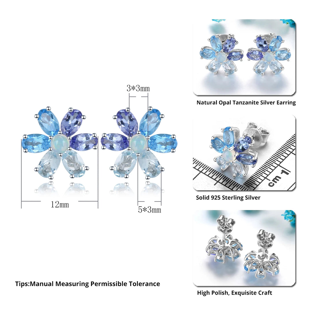 Flower-shaped silver earrings with blue gemstones on a white background, showing measurements and material details.