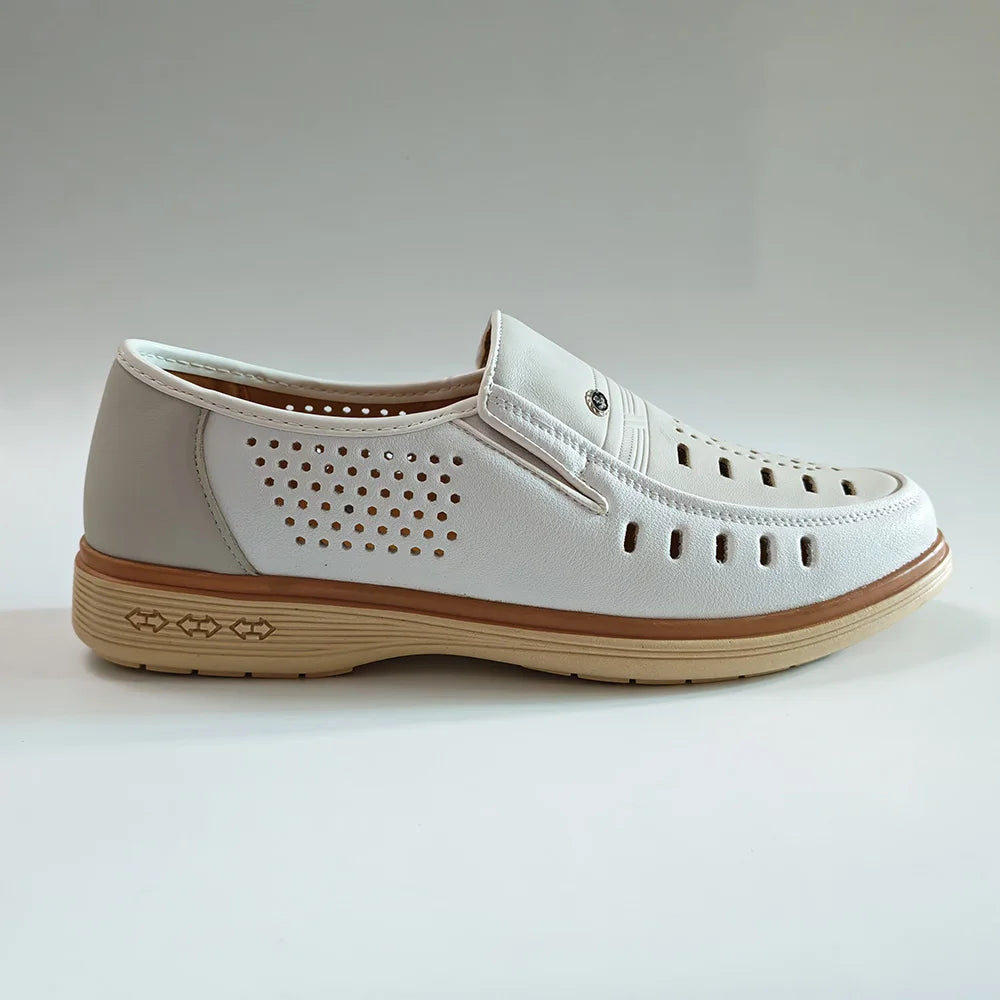 Men's beige leather slip-on loafer side profile with perforated upper