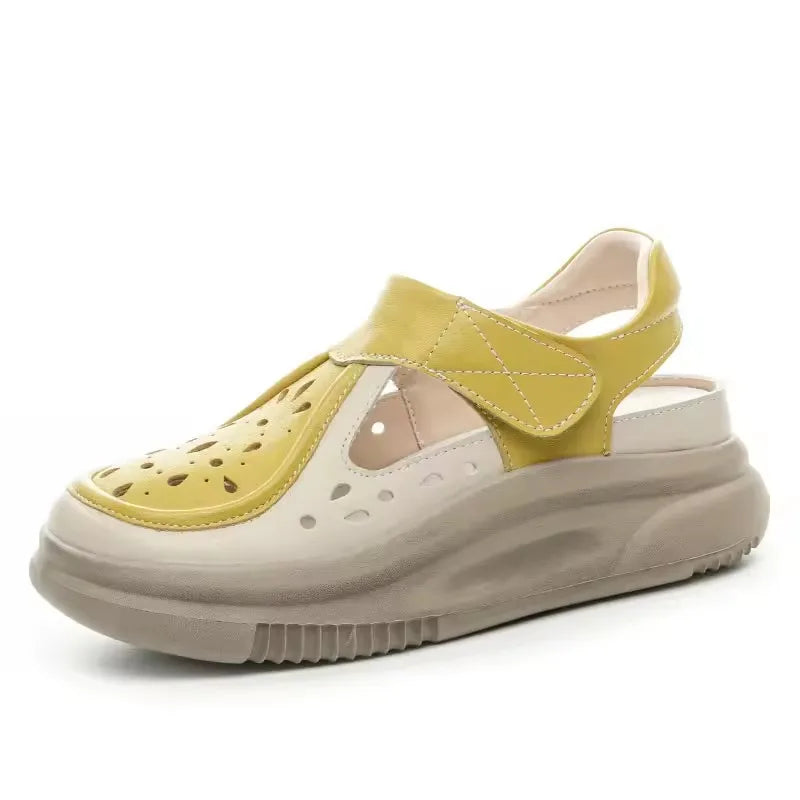 Yellow and white thick-sole leather sandals with hook-and-loop strap, front view