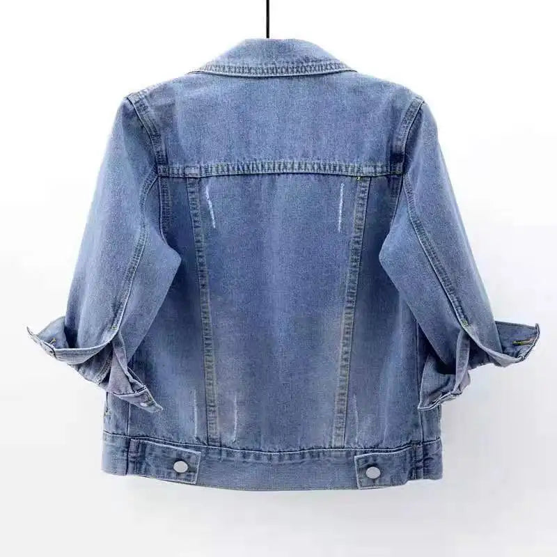 Blue denim jacket back view with button placket and two flap pockets