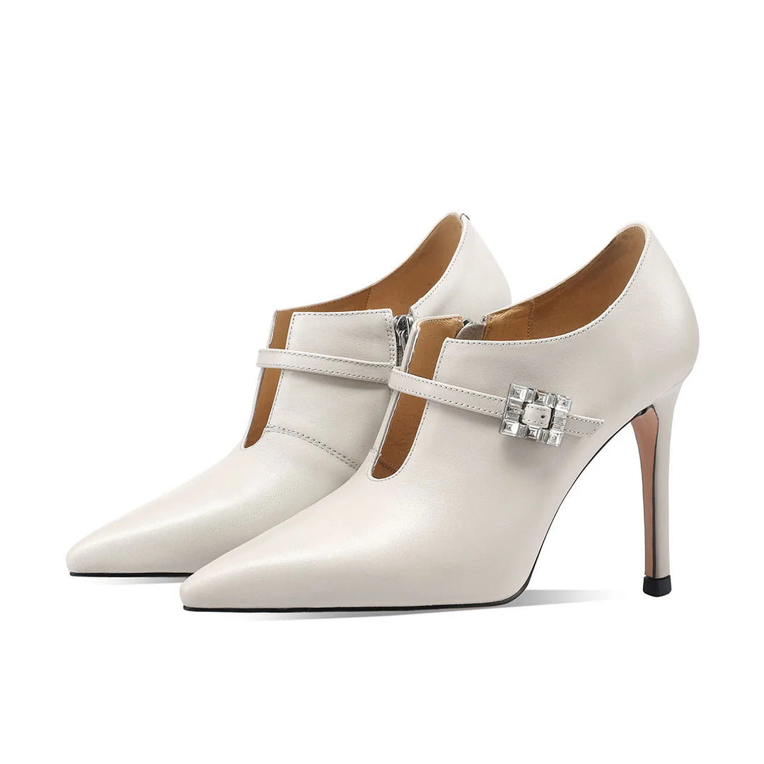 Beige pointed-toe cowhide pumps with ankle strap and square buckle, high heel