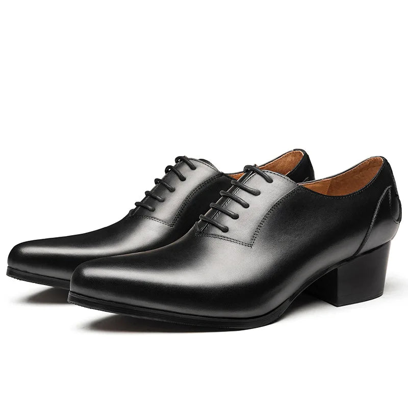 Pair of men's black leather Oxford shoes with pointed toe, lace-up, block heel