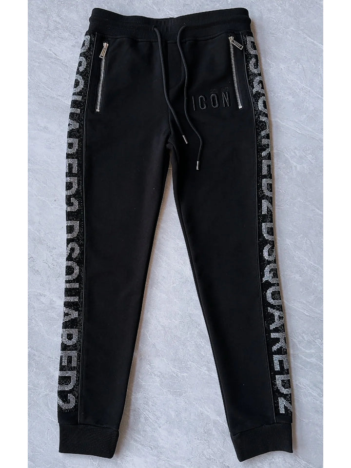 Black DSQUARED2 joggers with drawstring waist and vertical logo tape along the sides