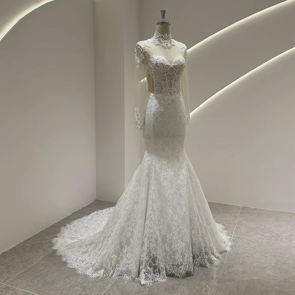 Ivory lace mermaid wedding gown with lace bodice and flared hem, long train