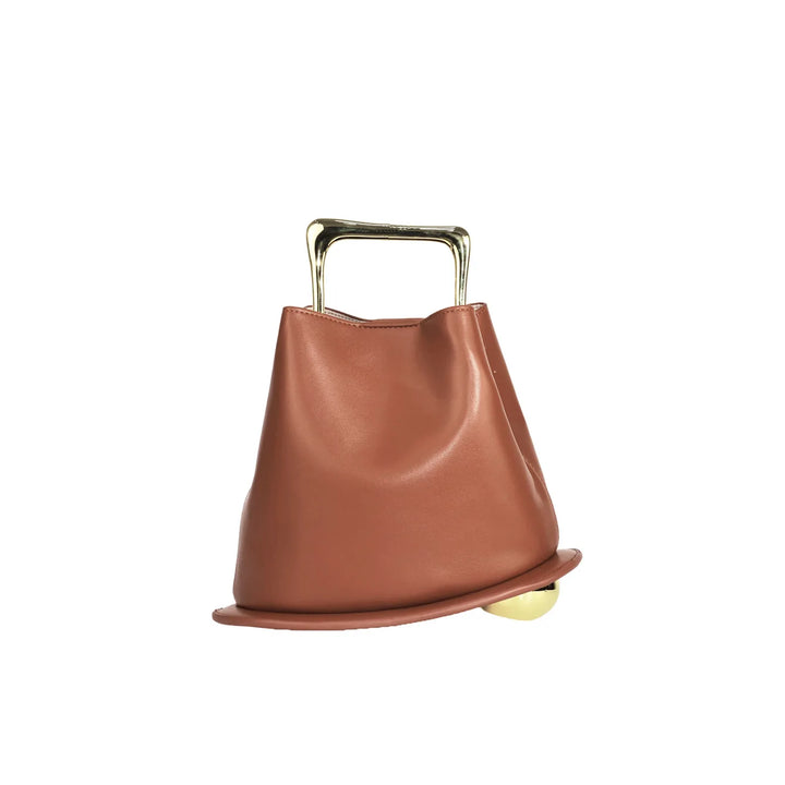 Brown leather crossbody bag with top handle and folded drawstring silhouette
