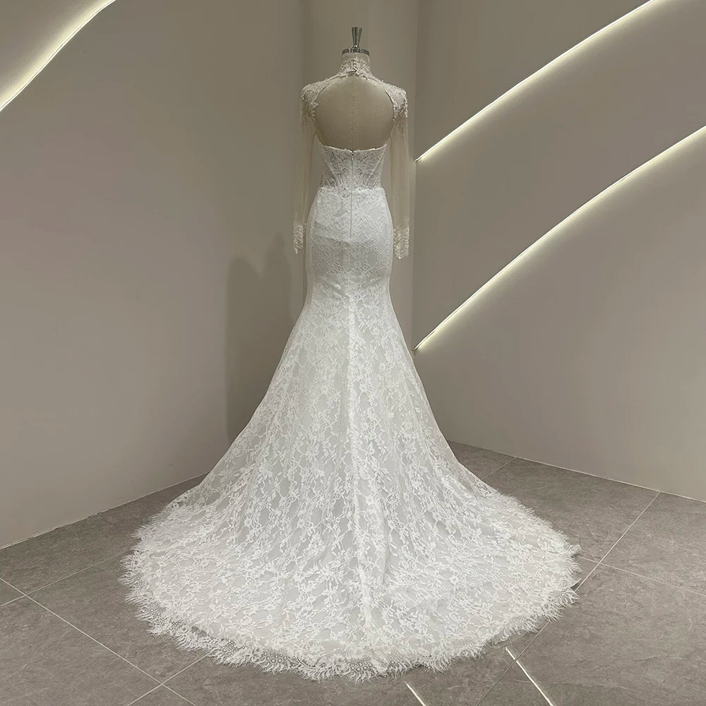Ivory lace mermaid wedding gown with lace overlay skirt and long train