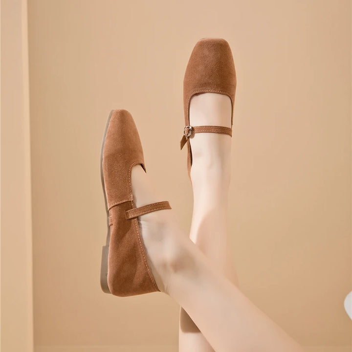 Brown suede flat shoes with tall instep strap and side buckle