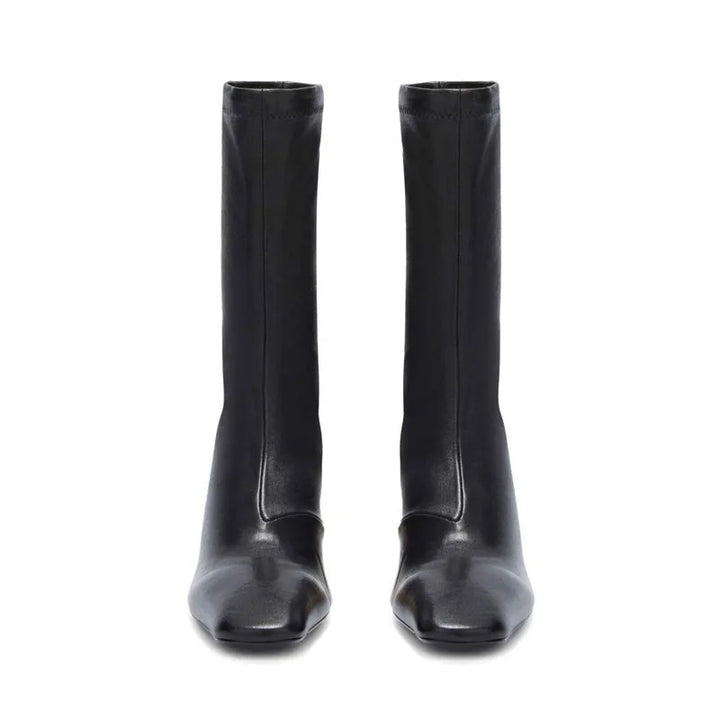 Pair of black square-toe ankle boots with mid block heel, back view