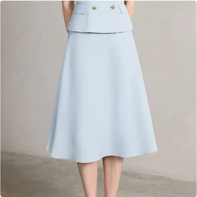 Light blue midi skirt from a women’s blazer suit, flared hem and smooth waistline