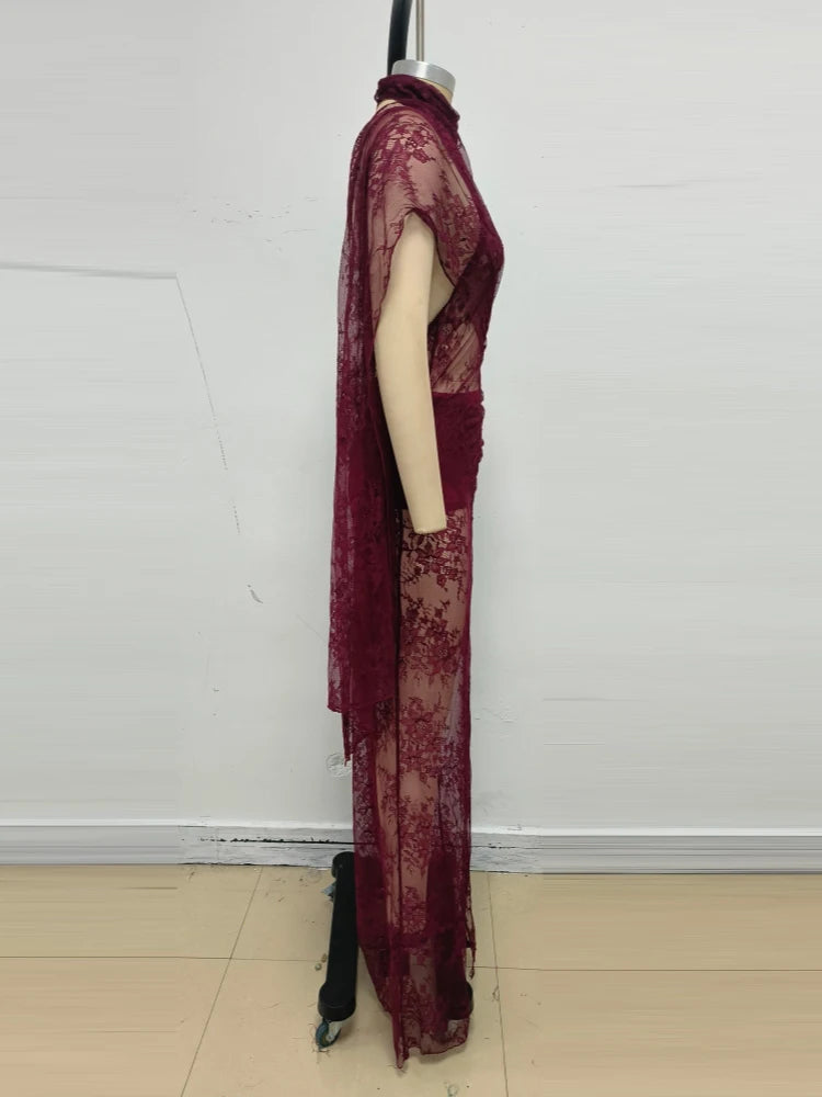 Burgundy sheer lace maxi gown side view with long overlay and flowing skirt