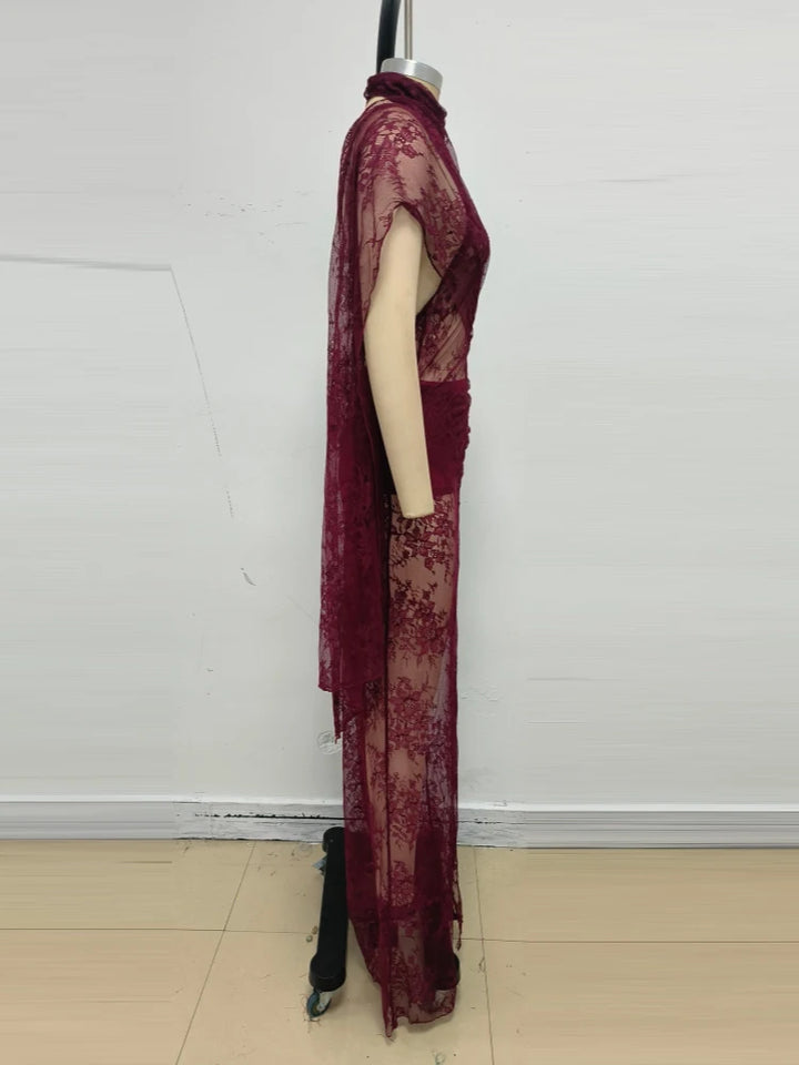 Burgundy sheer lace maxi gown side view with long overlay and flowing skirt