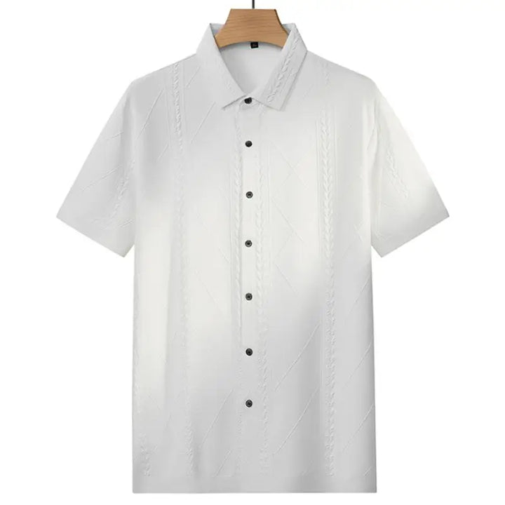 White loose-fit short-sleeve button-up shirt with textured argyle diamond pattern