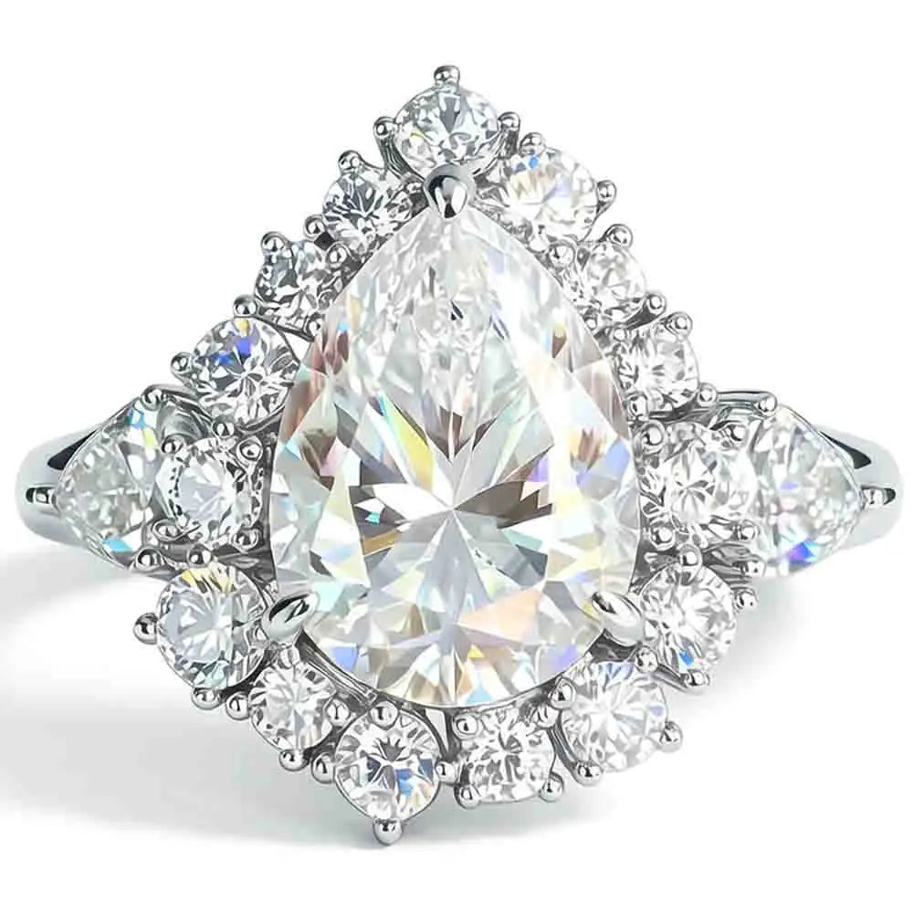 Pear-cut diamond ring with teardrop center stone and round halo gemstones