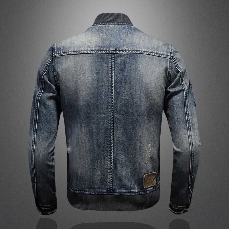 Men's light blue denim jacket back view with ribbed cuffs and stitched yoke seam