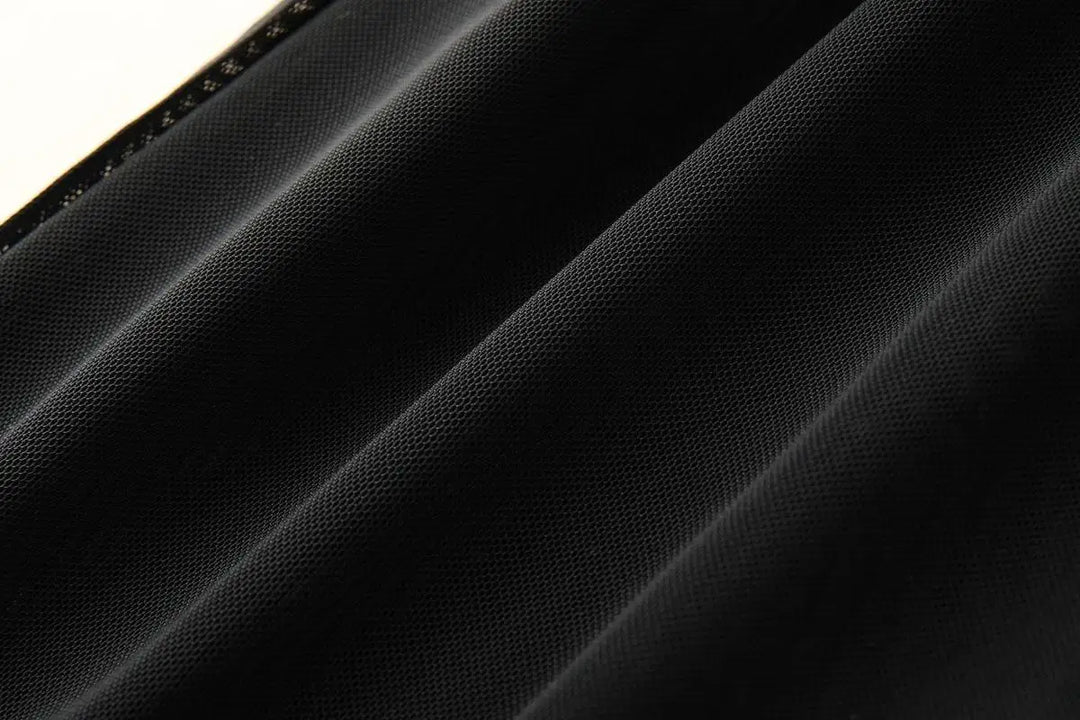 Close-up of black mesh fabric texture on a women&