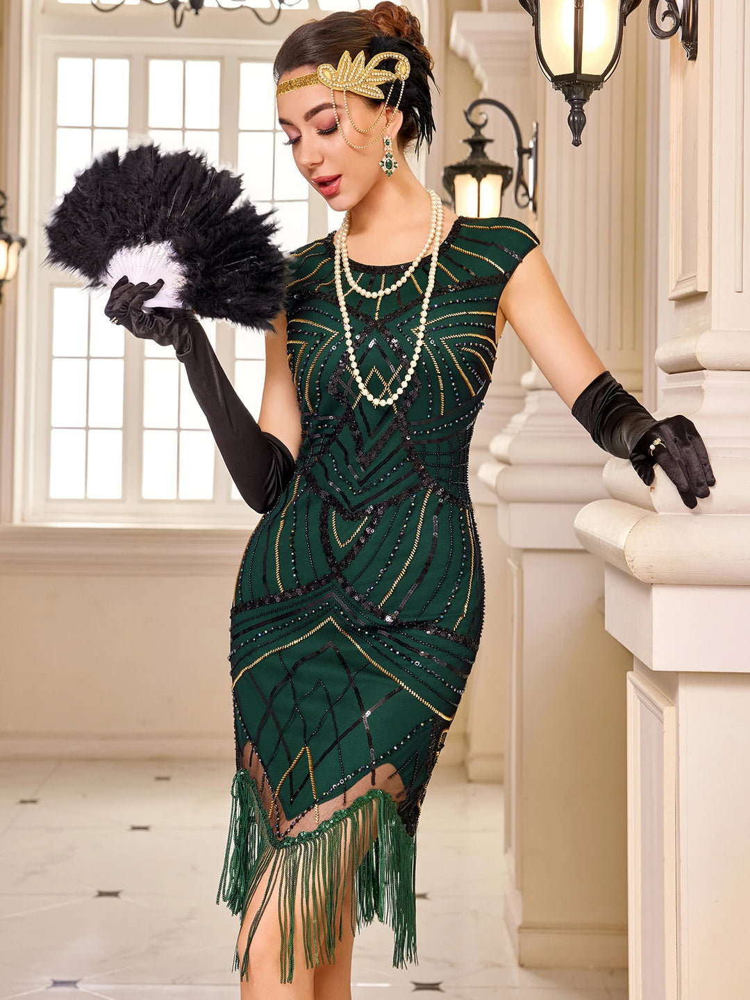Dark green sequin flapper dress with layered geometric pattern and fringe detail