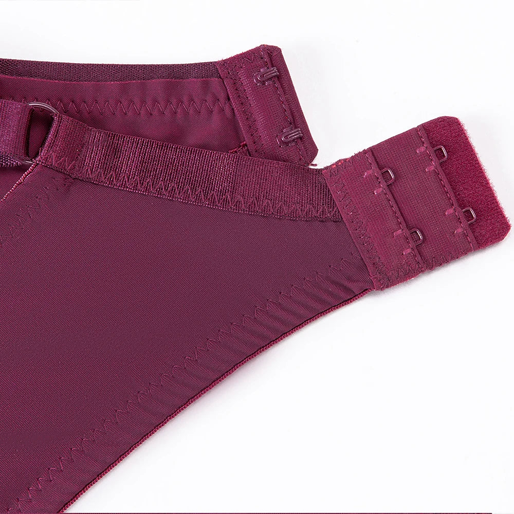 Deep plum bra back band with elastic strap and hook-and-eye closure