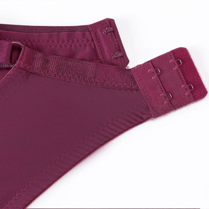 Deep plum bra back band with elastic strap and hook-and-eye closure