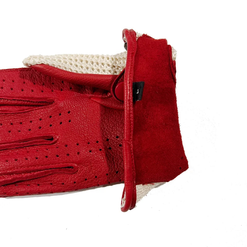 Red leather men’s gloves with knit cuff and strap detail featuring a small black tag.