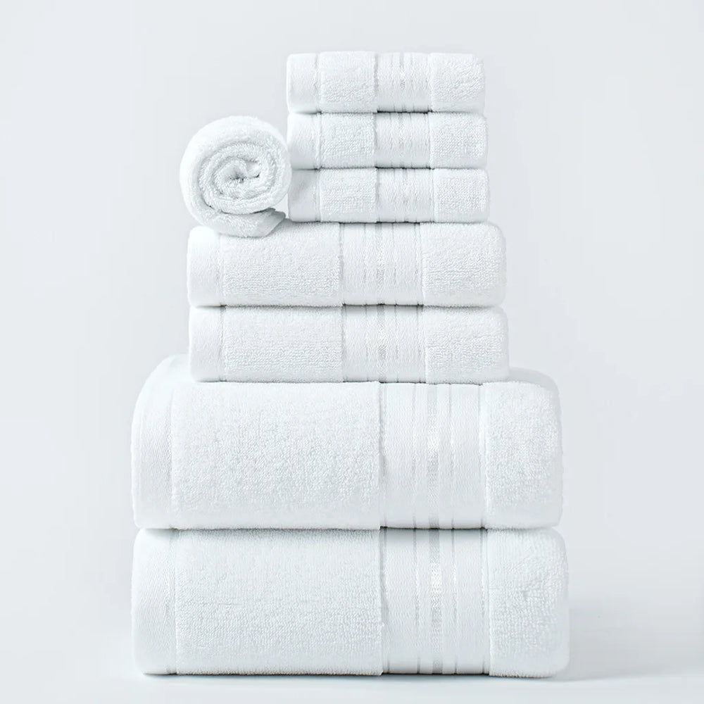 Thick cotton face towels, white, neatly folded in stacked set