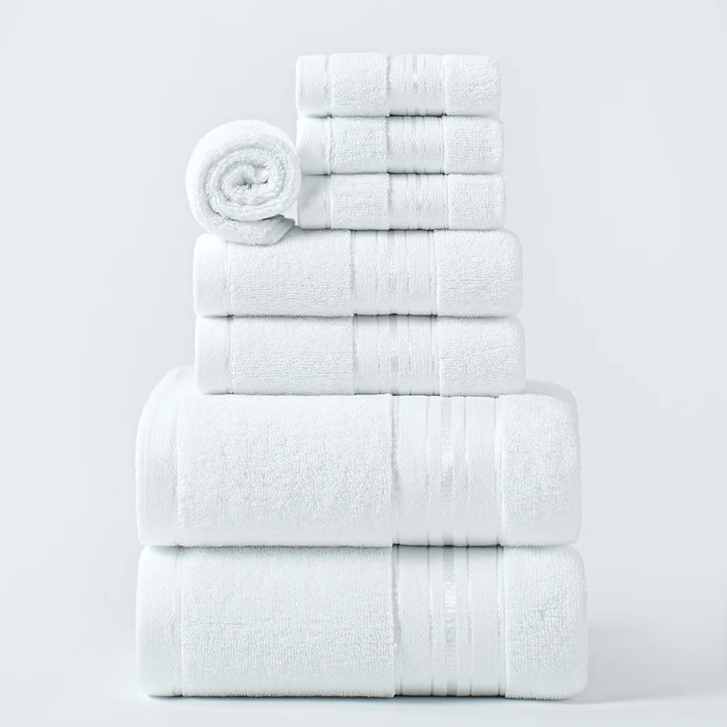 Thick cotton face towels, white, neatly folded in stacked set