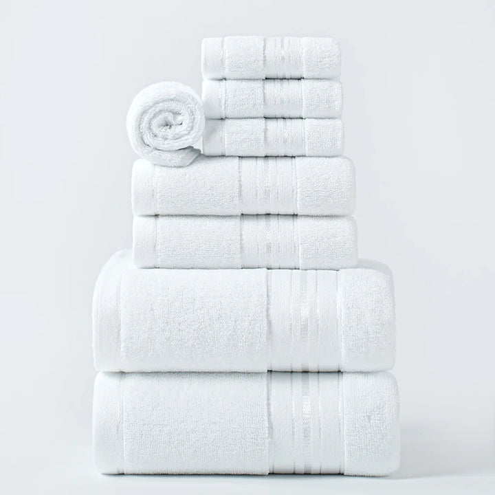 Thick cotton face towels, white, neatly folded in stacked set