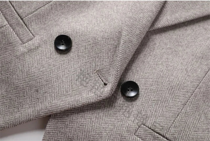 Herringbone padded waistcoat with two black button closures on the front