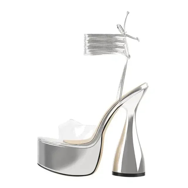 Open-toe spike-heel sandals with clear strap in silver tone, platform sole and spike heel