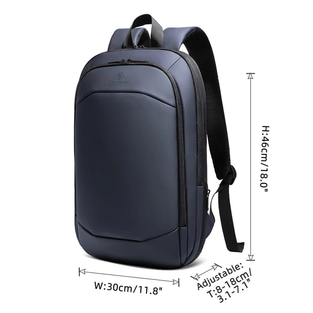 Dark blue slim waterproof travel backpack with front pocket and adjustable shoulder strap