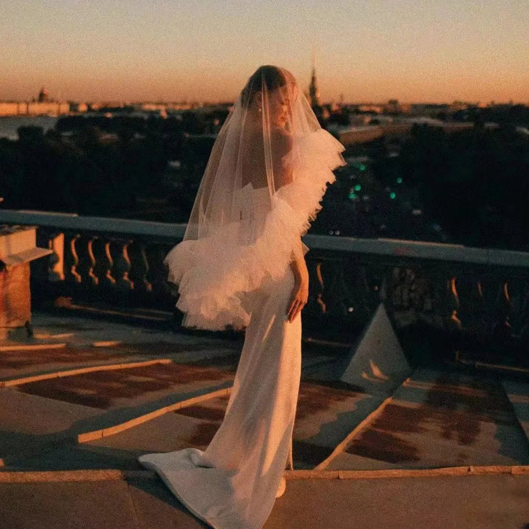White tulle bridal veil with ruffled edge, side view