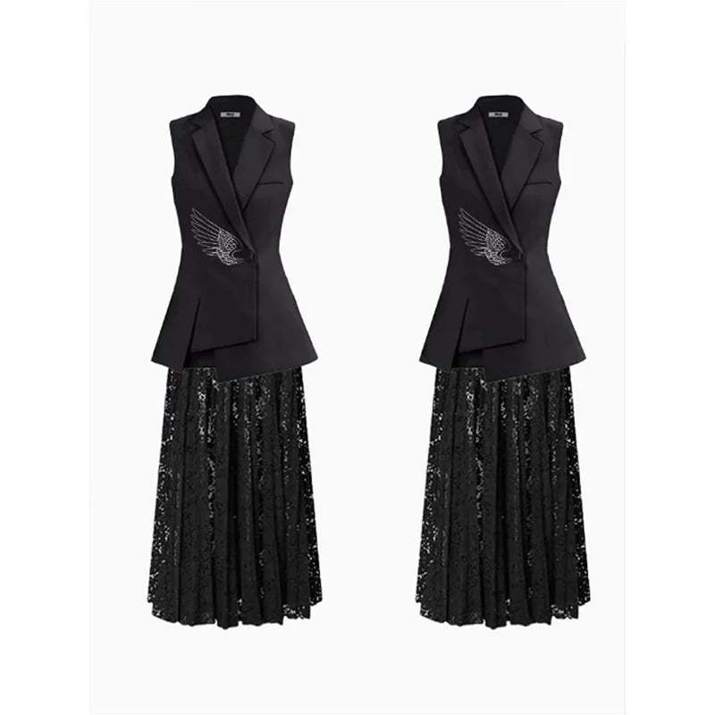 Black sleeveless blazer vest worn over black sequin lace skirt