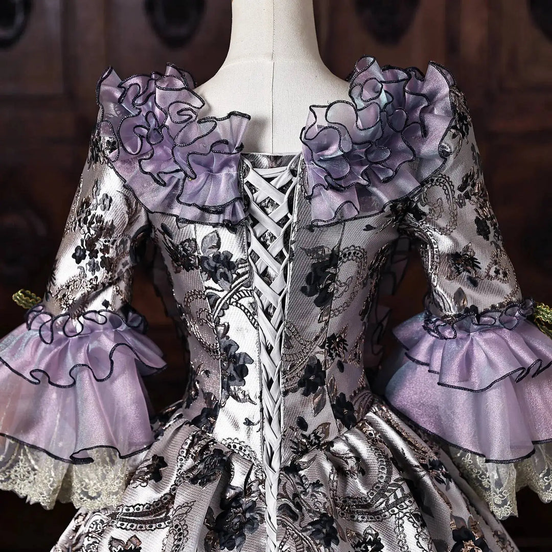 Purple lace corset bodice with metallic brocade panels, laced front and ruffled cuffs